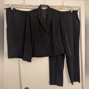 Women's suit, navy with white pinstripe, includes pants & skirt